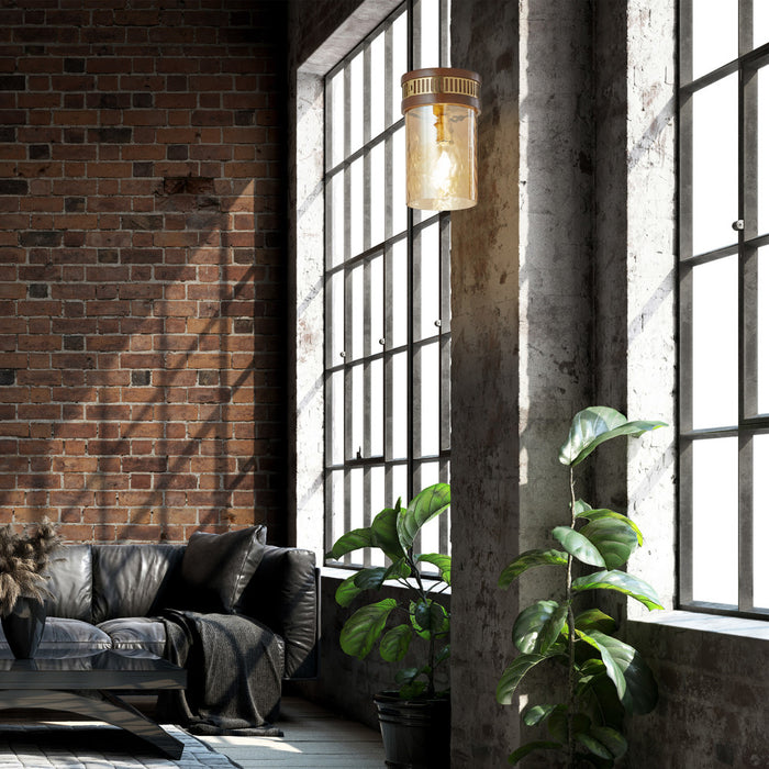 6.5" 1-Light Gold Pendant Light with Textured Glass Brown Mango Wood and Amber Glass Cylinder Shade in a modern living room with brick wall and large windows