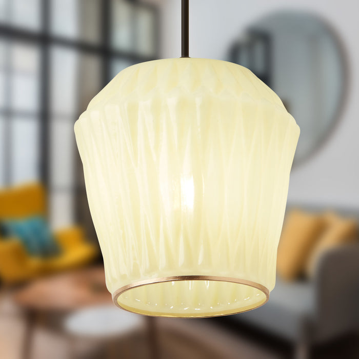 6.75" W Ken Glam Light Yellow and Gold Geometric Shaped Glass Shade Pendant in a room with blurred background