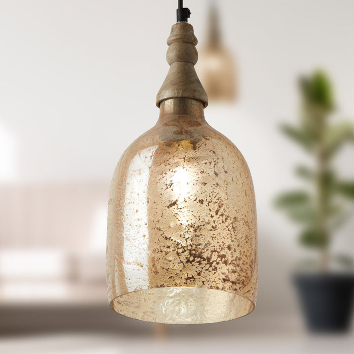 7" Regan Champagne Glass Pendant Light on a blurred background