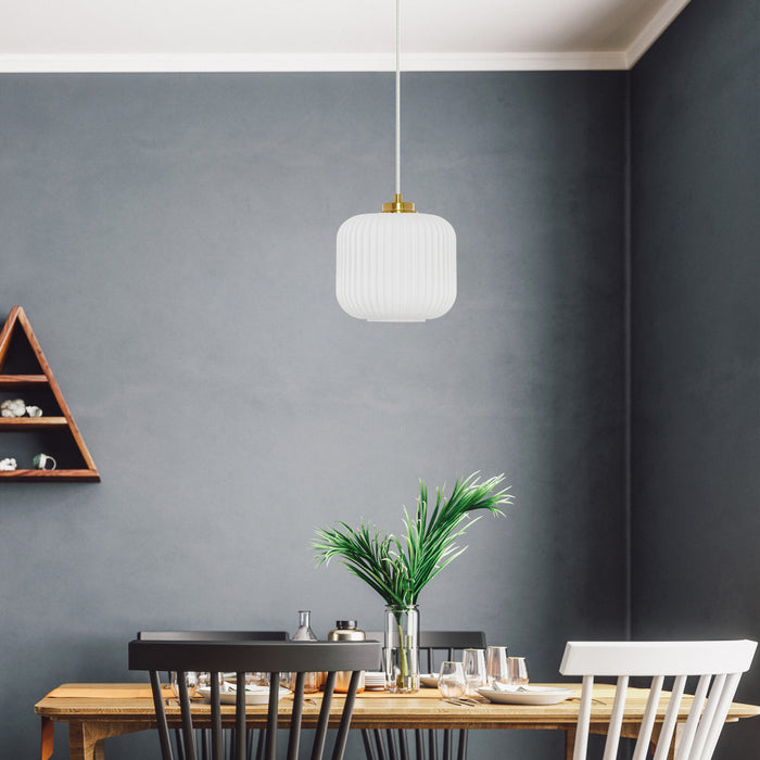 7.25"H Gael Retro Globe Shade Pendant Light hanging in a dining room with a wooden table and chairs against a gray wall.