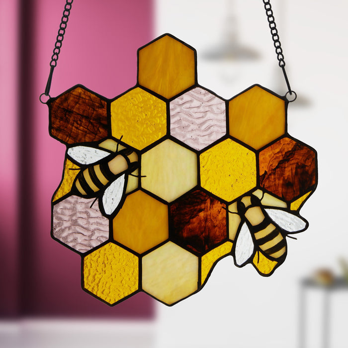 8.25"H Cassie Honeycomb Bees Stained Glass Window Panel against a blurred background