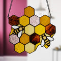 8.25"H Cassie Honeycomb Bees Stained Glass Window Panel against a blurred background