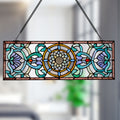 8.5"H Starla Rectangular Stained Glass Pub Window Panel hanging against a blurred indoor background