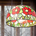 9.5" W Genevieve Red Flowers Stained Glass Dome Shade Pendant Light on a blurred background