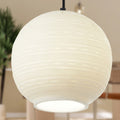 9.5" W Scarlett Modern White Blown Glass Globe Shade Pendant Light with a blurred background