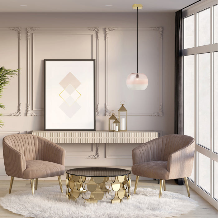 9.8" W Danielle Glam Pink/White Ombre Glass Globe Shade Pendant Light in a modern living room with two beige armchairs, a gold coffee table, and decorative elements.