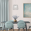 9.875"W Lucai Caged Globe Shade Pendant Light in a dining room with a table and chairs, decorative vase, and abstract painting.