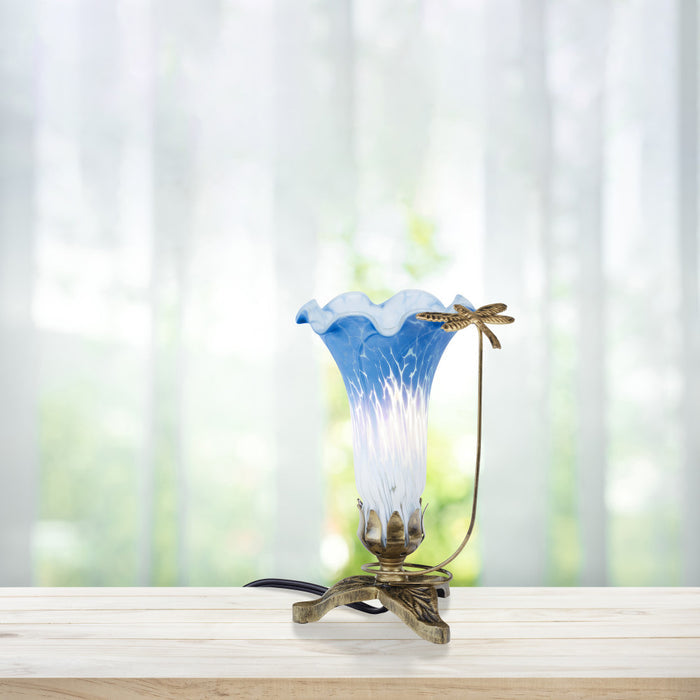 9"H Handpainted Glass Dragonfly Lily Lamp on a wooden surface with a blurred natural background