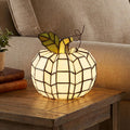 9"H Patch the Pumpkin Stained Glass Accent Lamp on a wooden table
