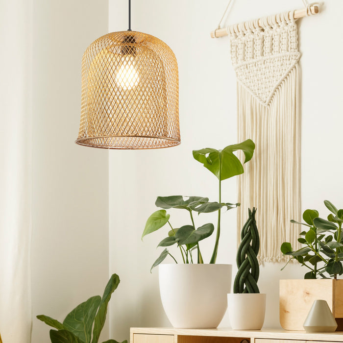 Azure Gold Bell-Shaped Pendant Lamp with plants and a macrame wall hanging in a room.