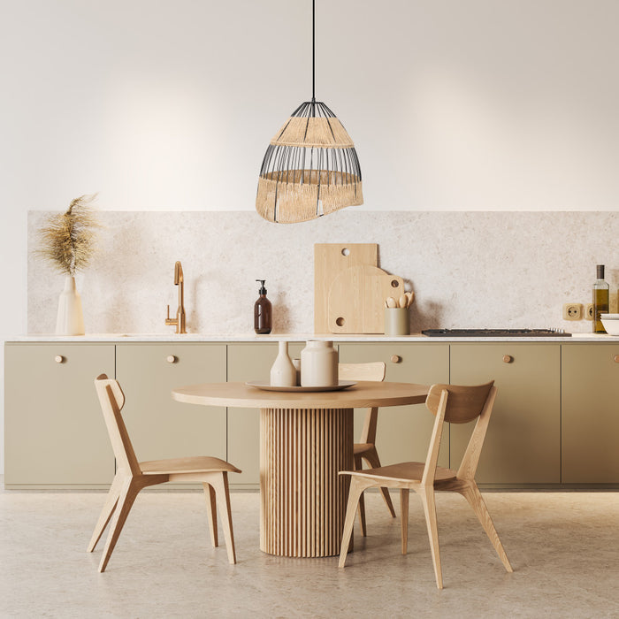 Bertram 19"W Asymmetrical Jute and Black Pendant Light in a modern kitchen with a round wooden dining table and chairs, and light-colored cabinets.