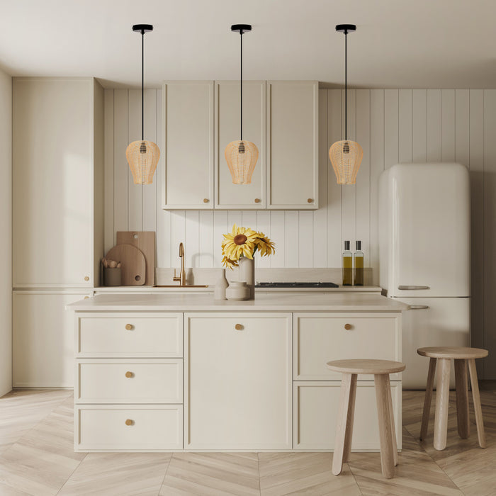 Chanda 9.25"W Glam Gold Bell Pendant Light in a modern kitchen with light wood cabinets, white marble countertop, and wooden stools.