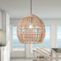 Charlotte Metal and Woven Hemp Rope Hanging Pendant Light hanging in a room with large windows
