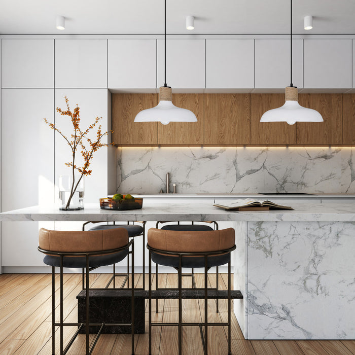 Danica 14"W White and Jute Drum Pendant Light in a modern kitchen with marble countertops, wooden cabinets, and bar stools.