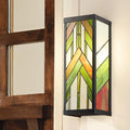 Green Stained Glass and Black Satin Rectangular 1-Light Outdoor Wall Sconce mounted by a front door to a house