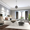 Magnolia 16.25"W Modern Black Abstract Globe Metal Pendant Light in a modern bedroom with a large bed, decorative pillows, and a large window.