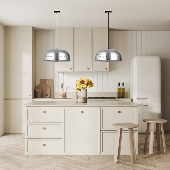Sybil 17.75"W Star-Shaped Cutout Silver Pendant Light in a modern kitchen with light wood cabinets, white refrigerator, and wooden stools.