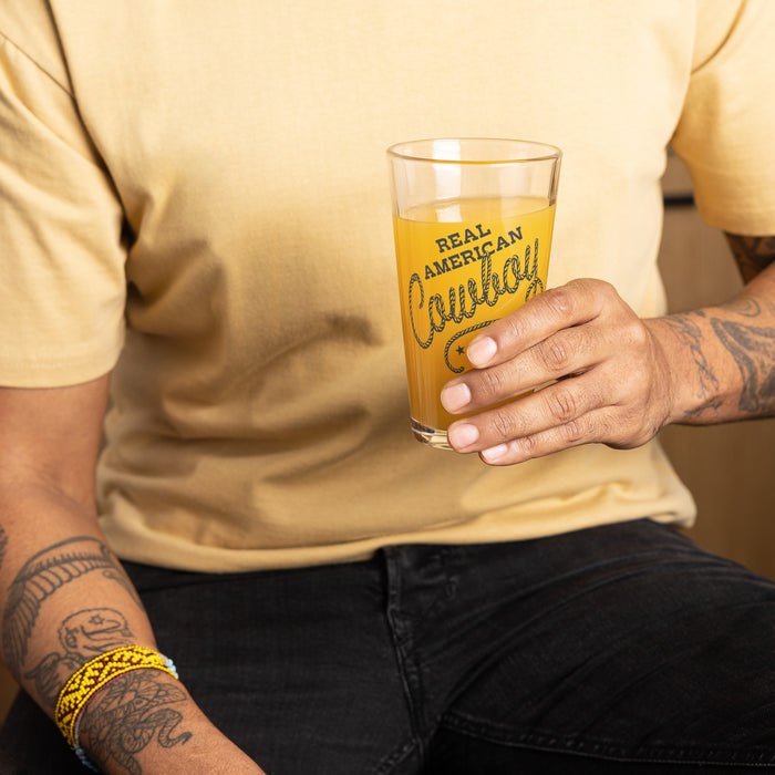The McBee Dynasty Pint Glass Real American Cowboy
