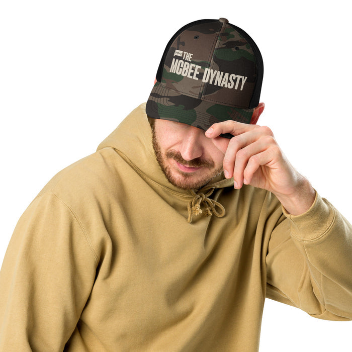 The McBee Dynasty Trucker Hat Logo Camouflage